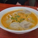 CHICKEN MOMO WITH SIGNATURE SAUCE